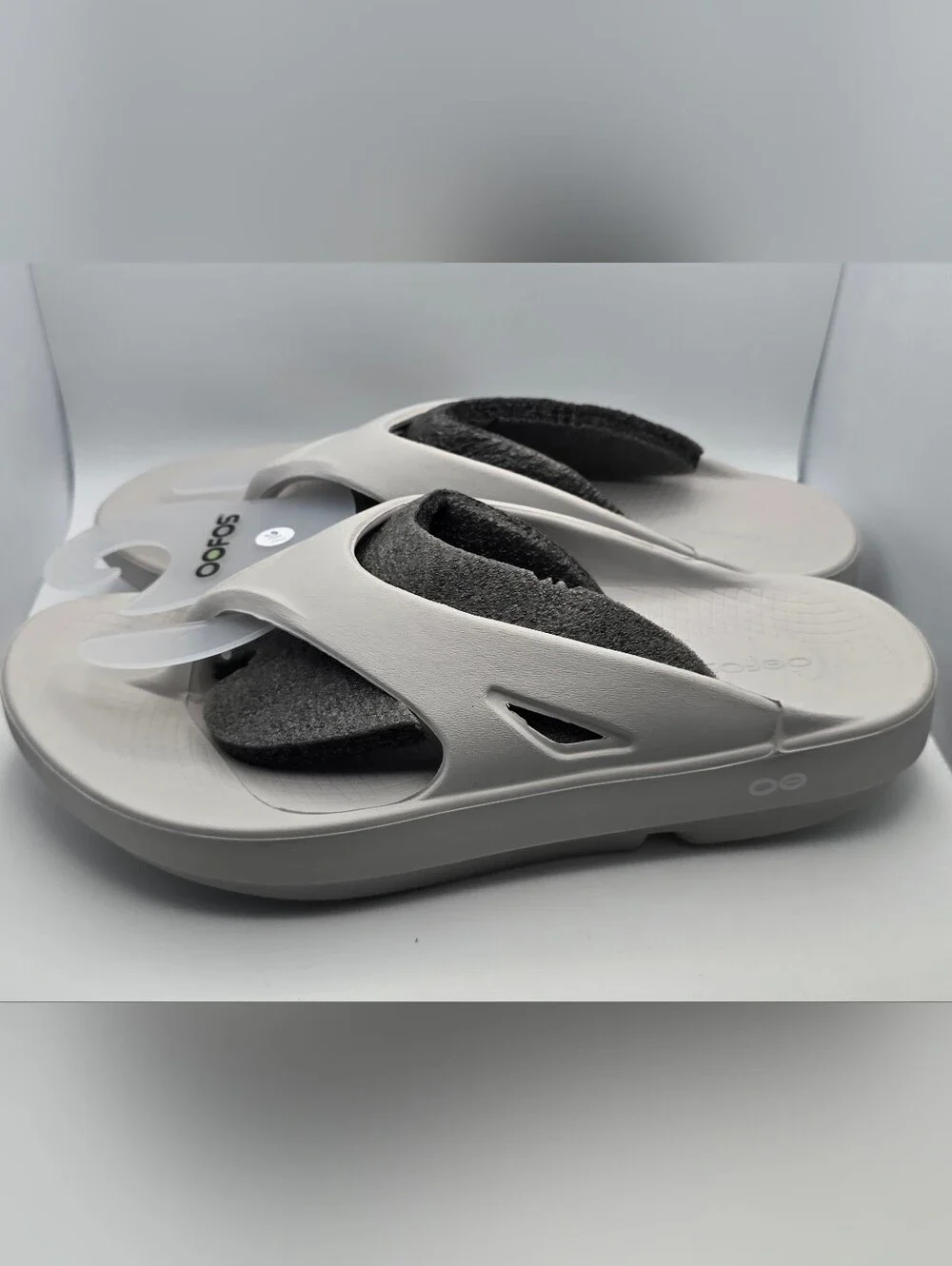 Oofos OOahh Slide Sandals in Light Gray with Dark Gray Footbed